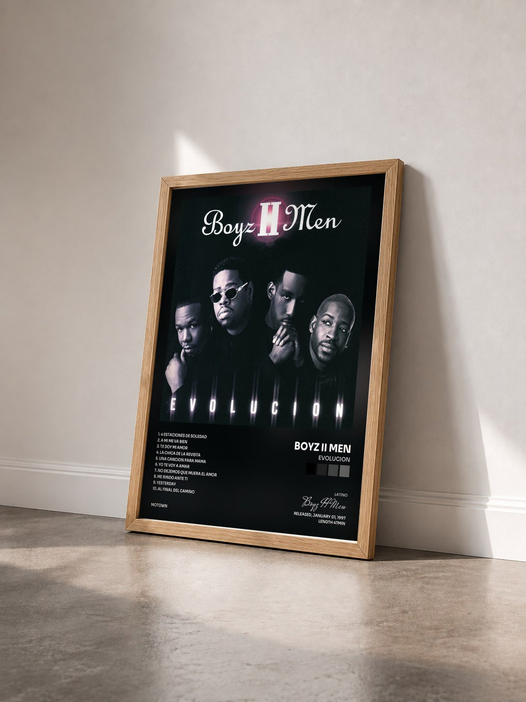 #bois Tableau de l'album Evolucion de Boyz II Men vu de trois quarts, cadre en bois brut