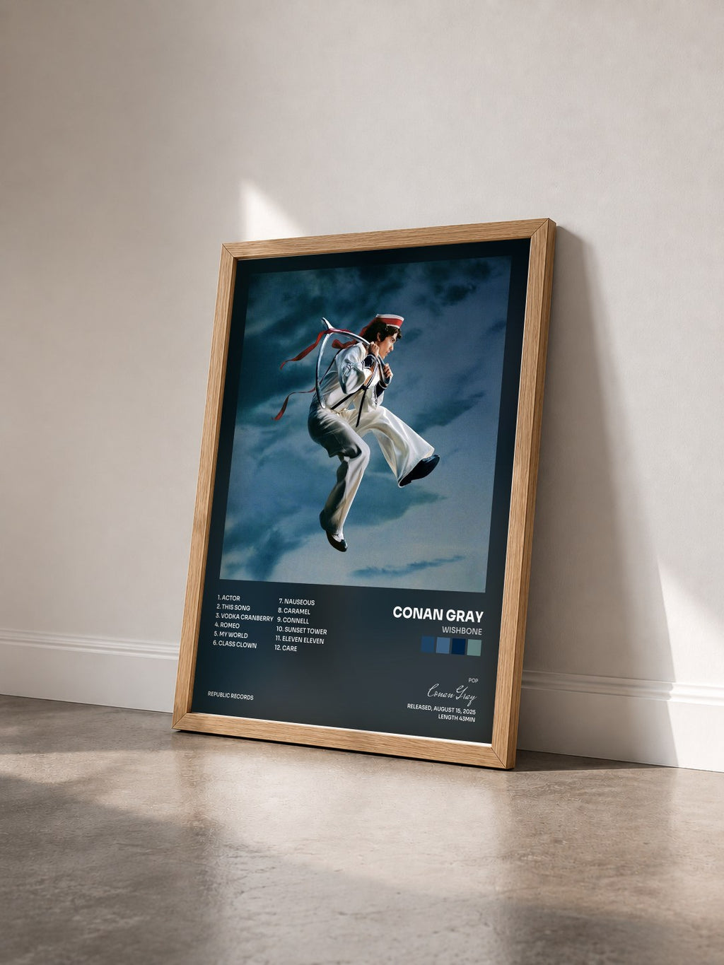 #bois Tableau de l'album Wishbone de Conan Gray vu de trois quarts, cadre en bois brut