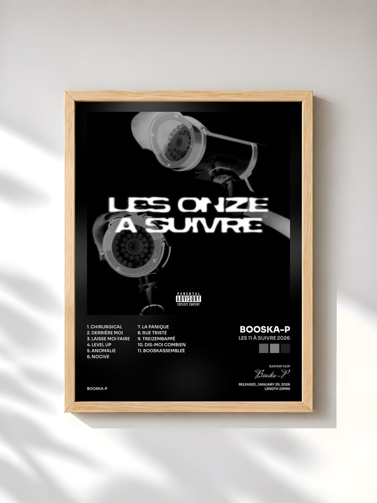 #bois Tableau de l'album Les 11 à suivre 2026 de Booska-P, cadre en bois brut, imprimé et encadré en France