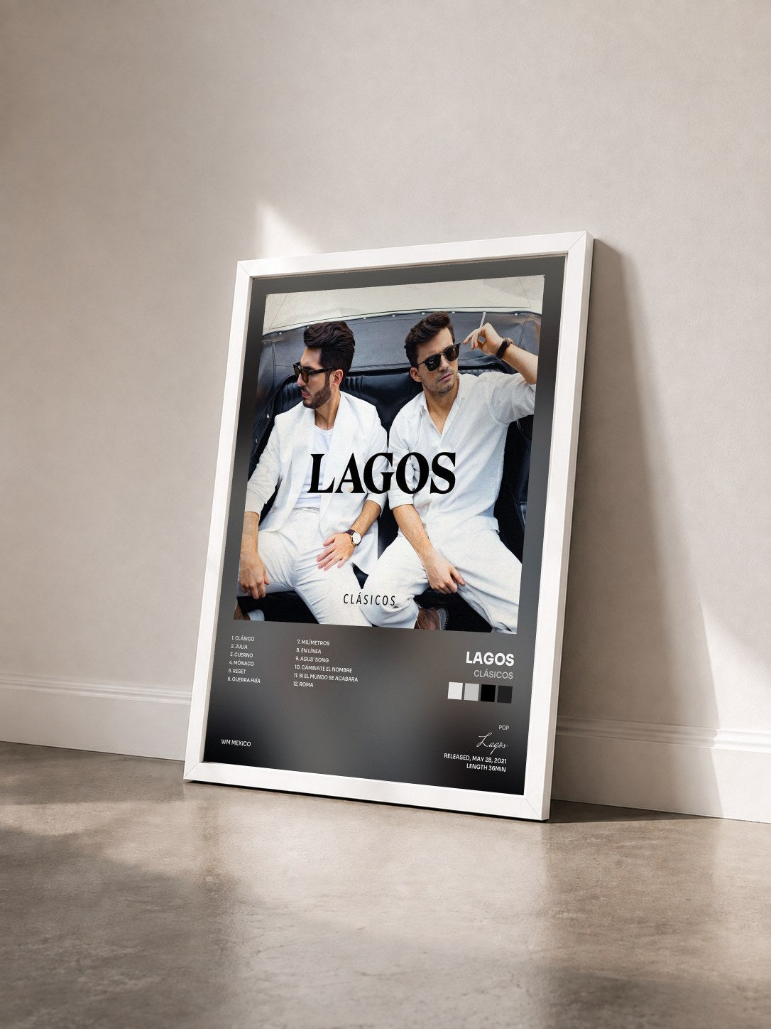 #blanc Tableau de l'album Clásicos de Lagos vu de trois quarts, cadre blanc
