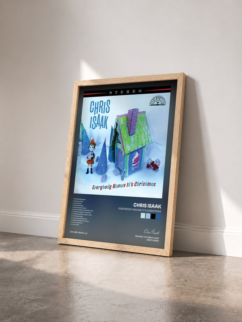 #bois Tableau de l'album Everybody Knows It's Christmas de Chris Isaak vu de trois quarts, cadre en bois brut