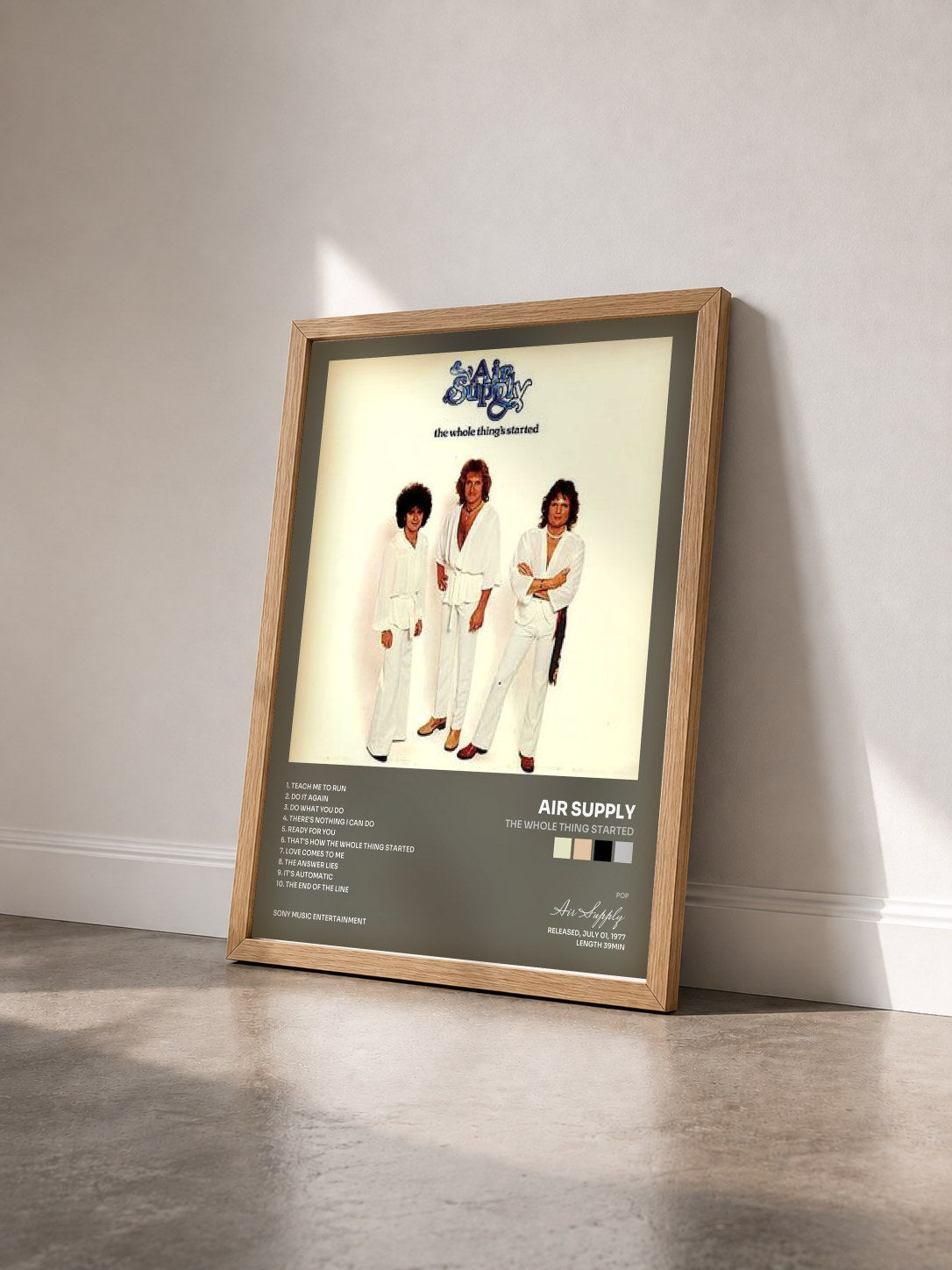 #bois Tableau de l'album The Whole Thing Started de Air Supply vu de trois quarts, cadre en bois brut