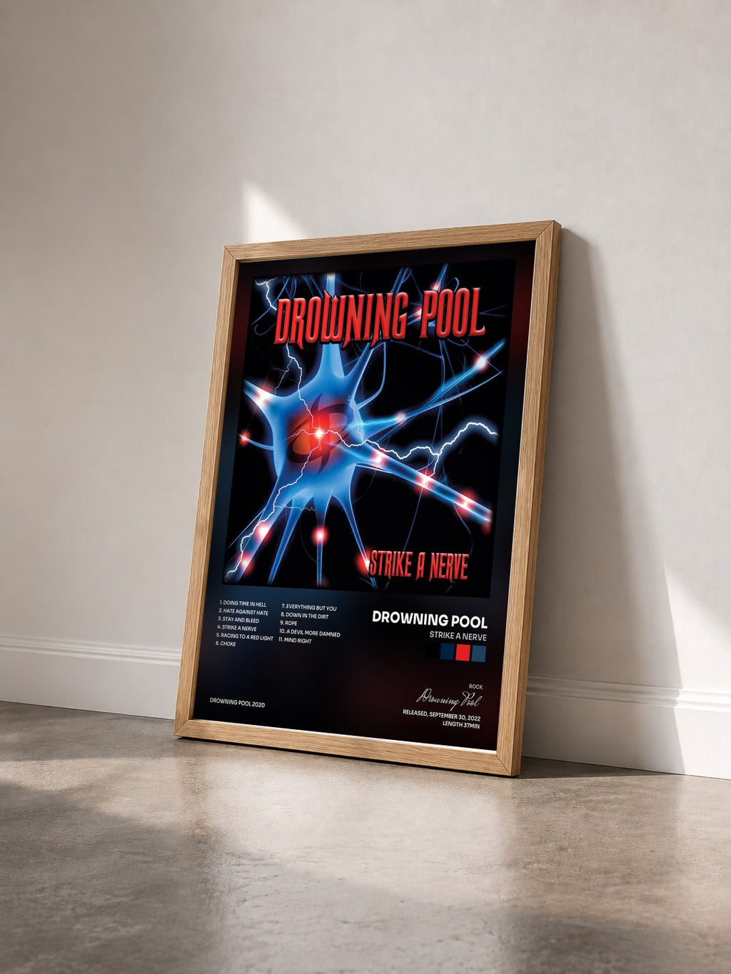 #bois Tableau de l'album Strike A Nerve de Drowning Pool vu de trois quarts, cadre en bois brut