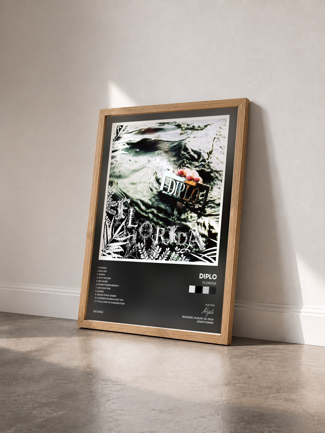 #bois Tableau de l'album Florida de Diplo vu de trois quarts, cadre en bois brut