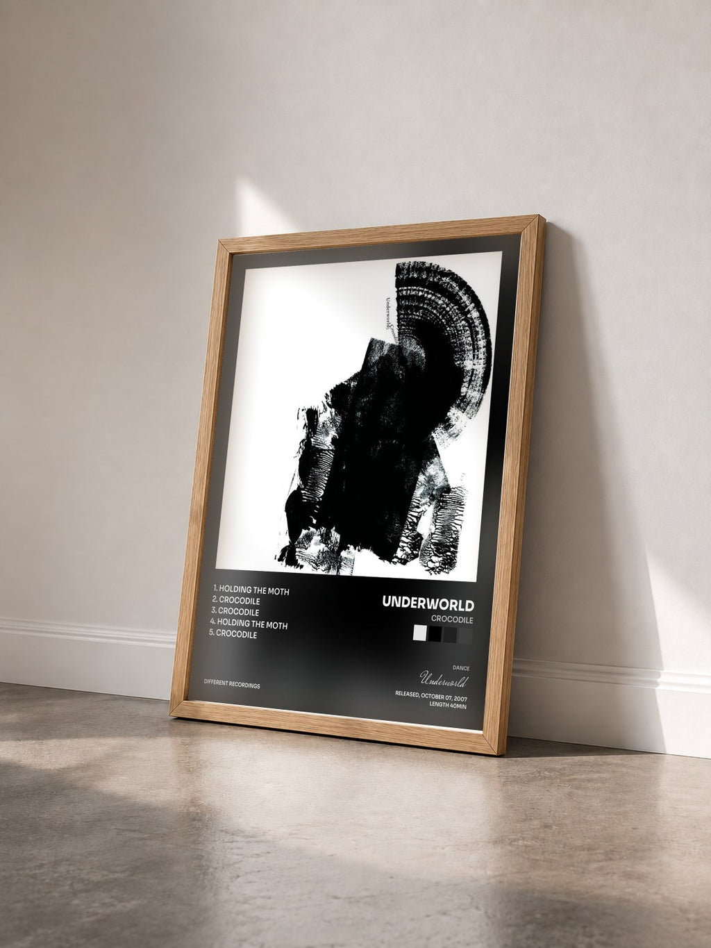#bois Tableau de l'album Crocodile de Underworld vu de trois quarts, cadre en bois brut