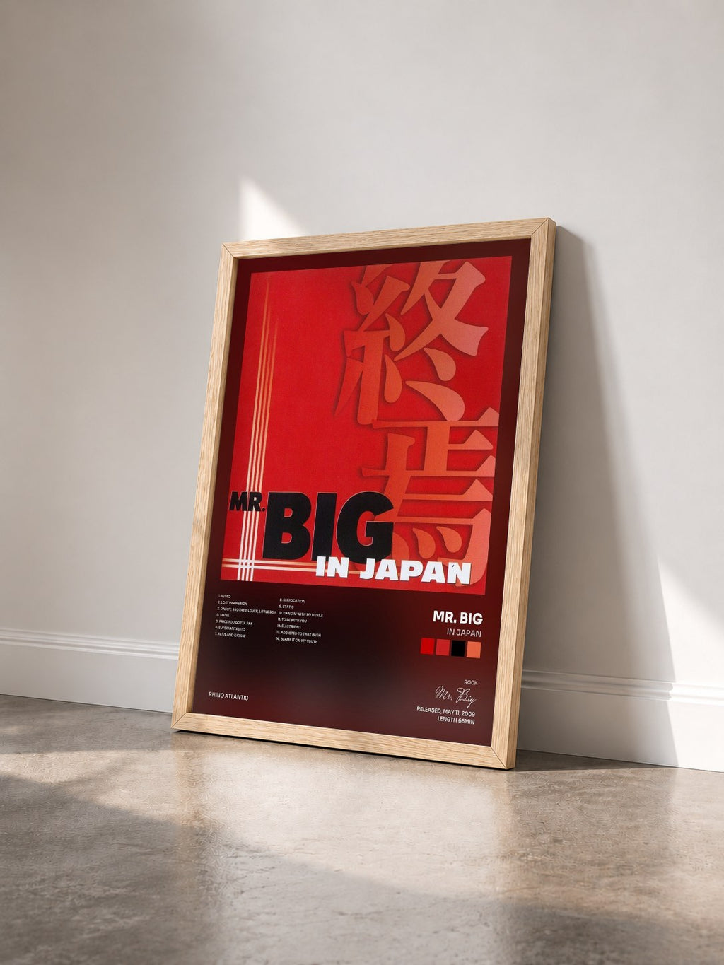 #bois Tableau de l'album In Japan de Mr. Big vu de trois quarts, cadre en bois brut