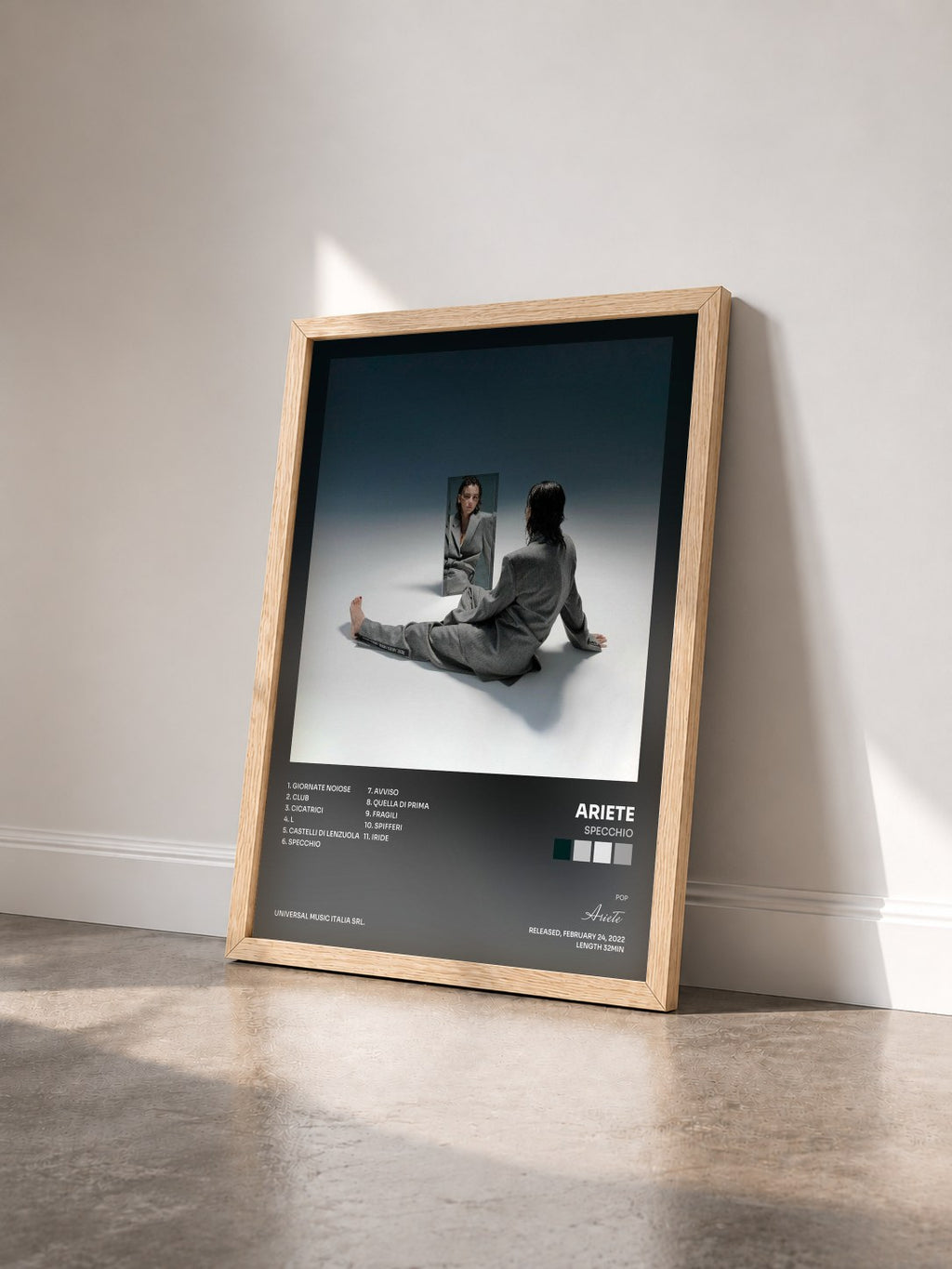 #bois Tableau de l'album SPECCHIO de Ariete vu de trois quarts, cadre en bois brut