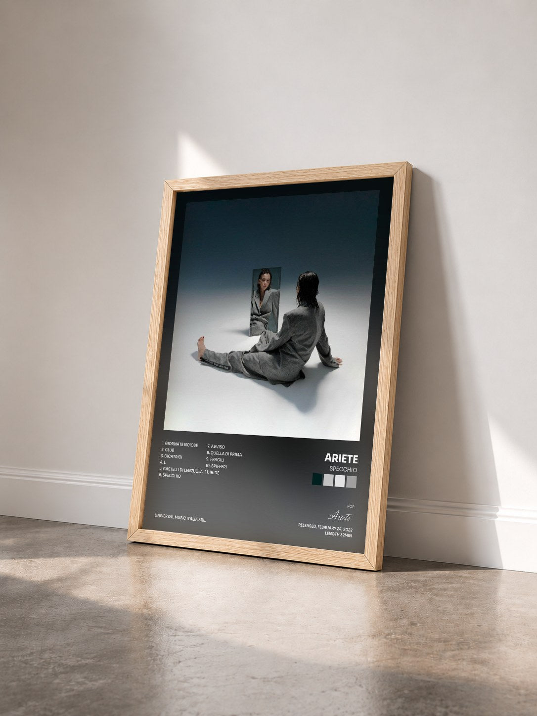 #bois Tableau de l'album SPECCHIO de Ariete vu de trois quarts, cadre en bois brut