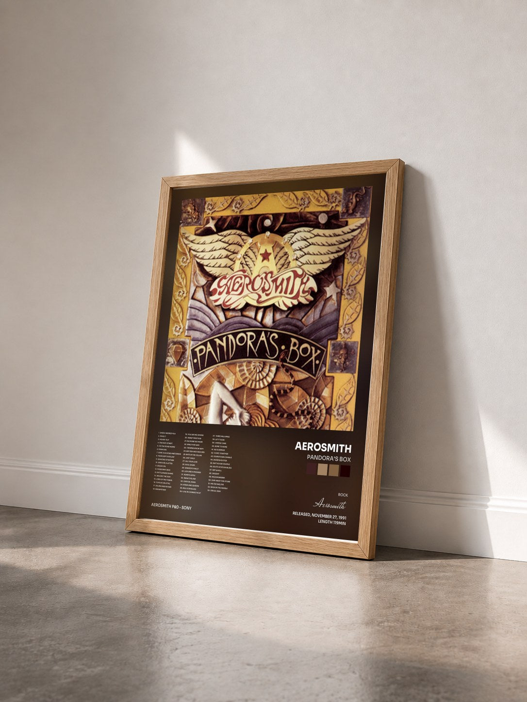 #bois Tableau de l'album Pandora's Box de Aerosmith vu de trois quarts, cadre en bois brut