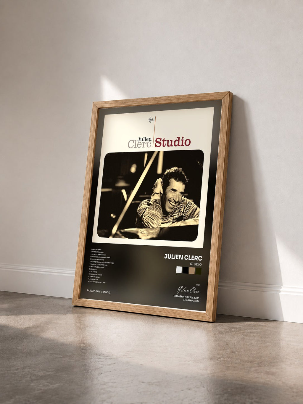 #bois Tableau de l'album Studio de Julien Clerc vu de trois quarts, cadre en bois brut