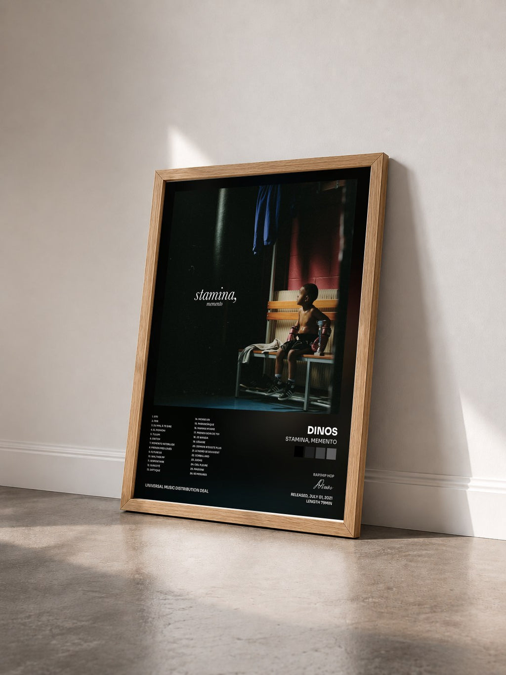 #bois Tableau de l'album Stamina, Memento de Dinos vu de trois quarts, cadre en bois brut