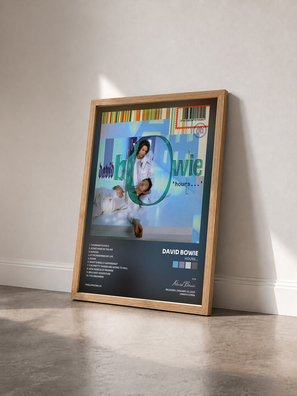#bois Tableau de l'album Hours... de David Bowie vu de trois quarts, cadre en bois brut