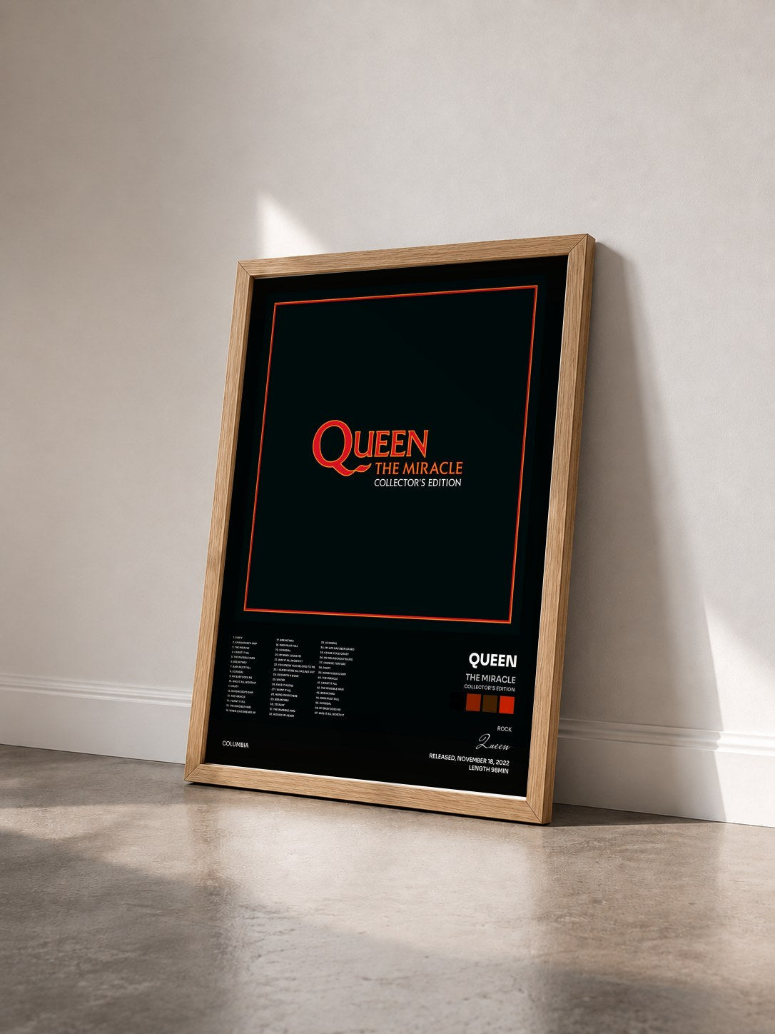 #bois Tableau de l'album The Miracle (Collector's Edition) de Queen vu de trois quarts, cadre en bois brut
