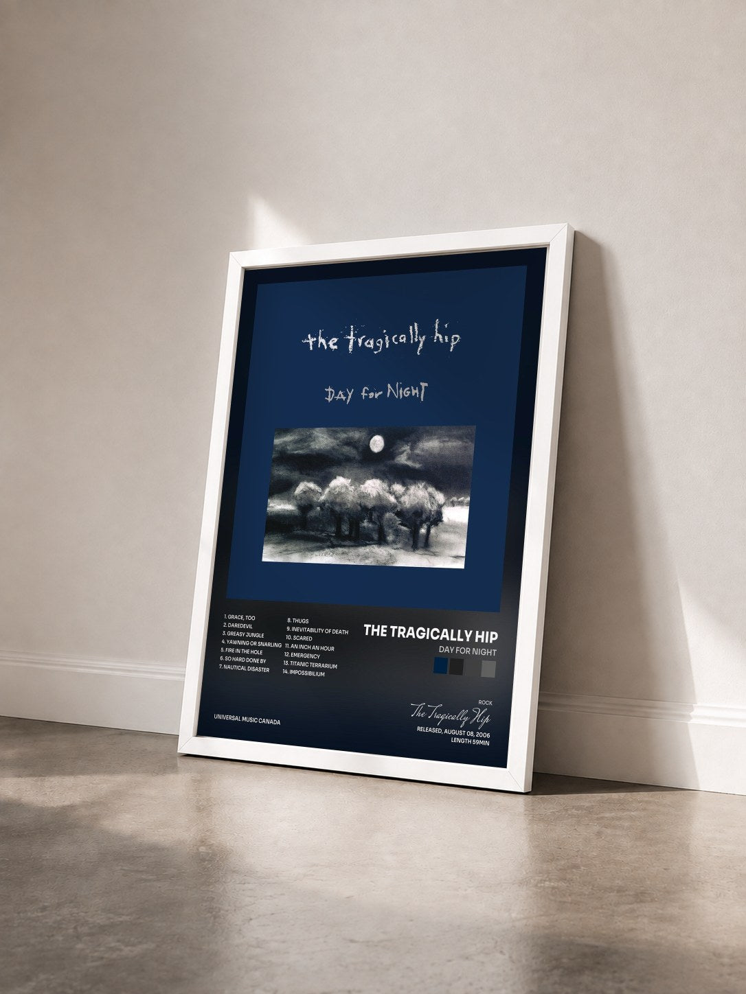 #blanc Tableau de l'album Day For Night de The Tragically Hip vu de trois quarts, cadre blanc