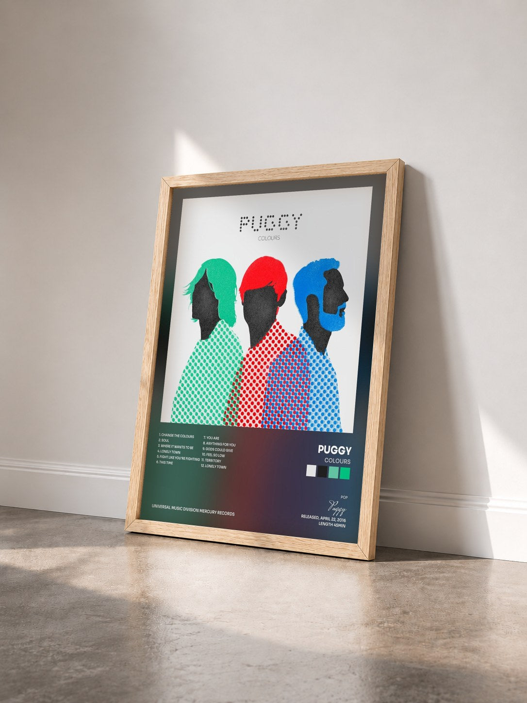 #bois Tableau de l'album Colours de Puggy vu de trois quarts, cadre en bois brut