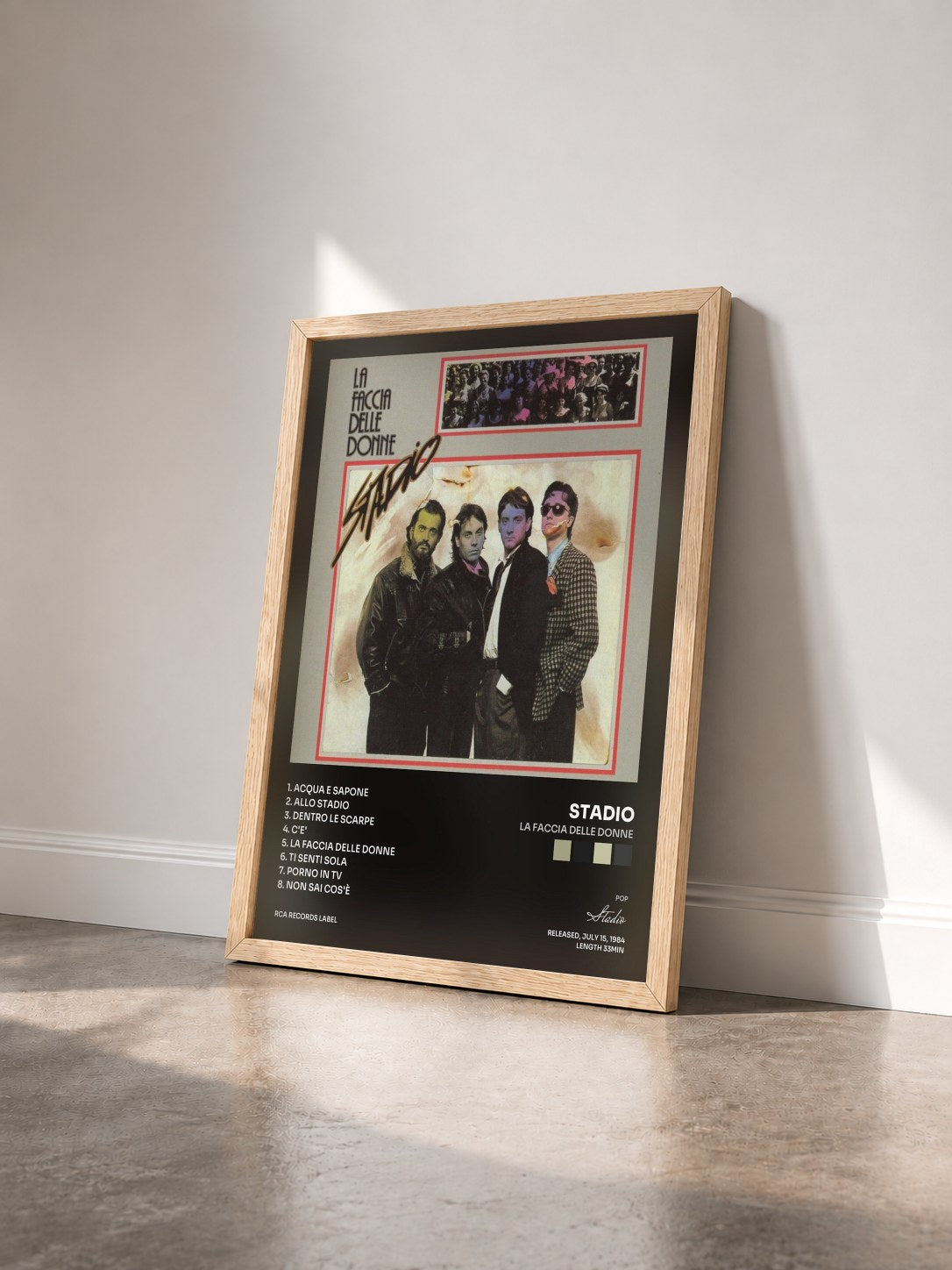 #bois Tableau de l'album La Faccia Delle Donne de Stadio vu de trois quarts, cadre en bois brut