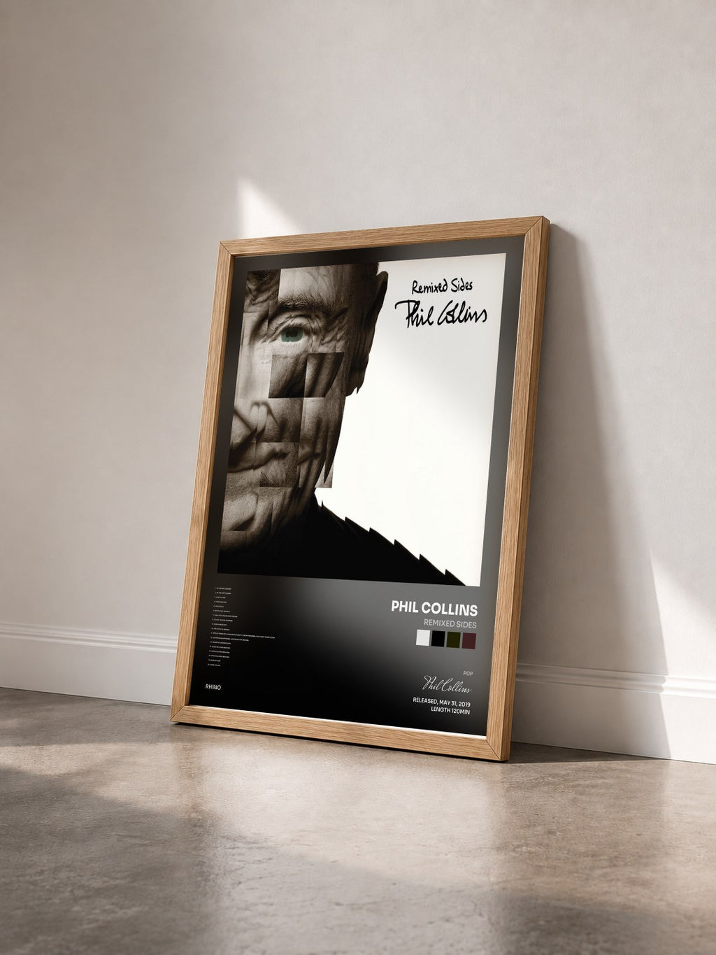 #bois Tableau de l'album Remixed Sides de Phil Collins vu de trois quarts, cadre en bois brut