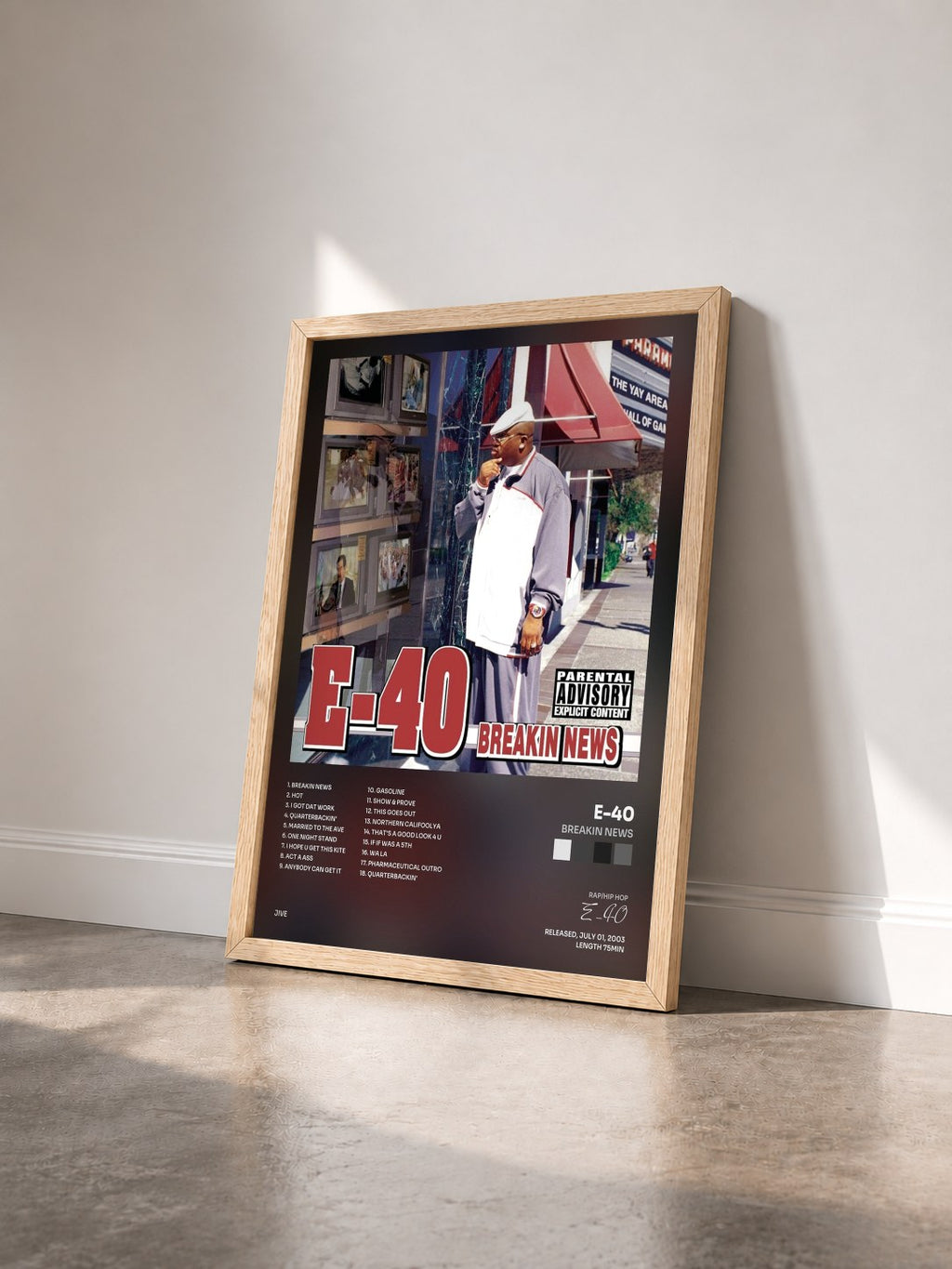 #bois Tableau de l'album Breakin News de E-40 vu de trois quarts, cadre en bois brut