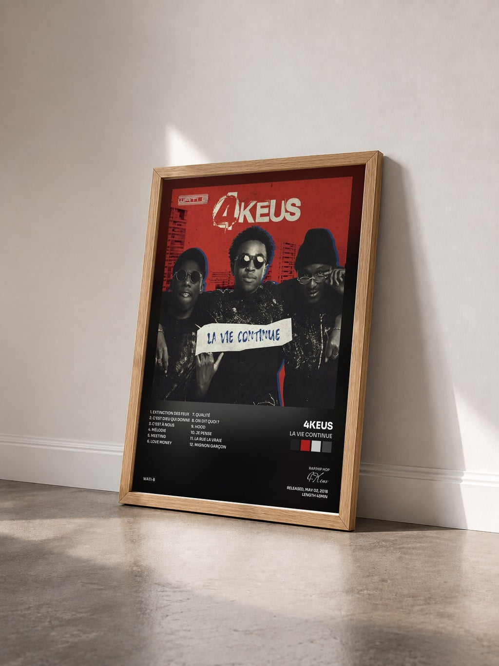 #bois Tableau de l'album La vie continue de 4Keus vu de trois quarts, cadre en bois brut