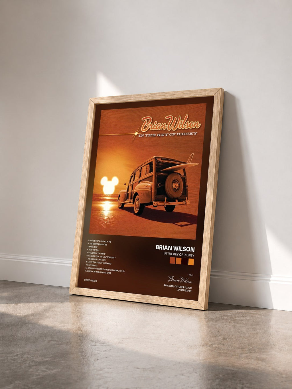 #bois Tableau de l'album In the Key of Disney de Brian Wilson vu de trois quarts, cadre en bois brut