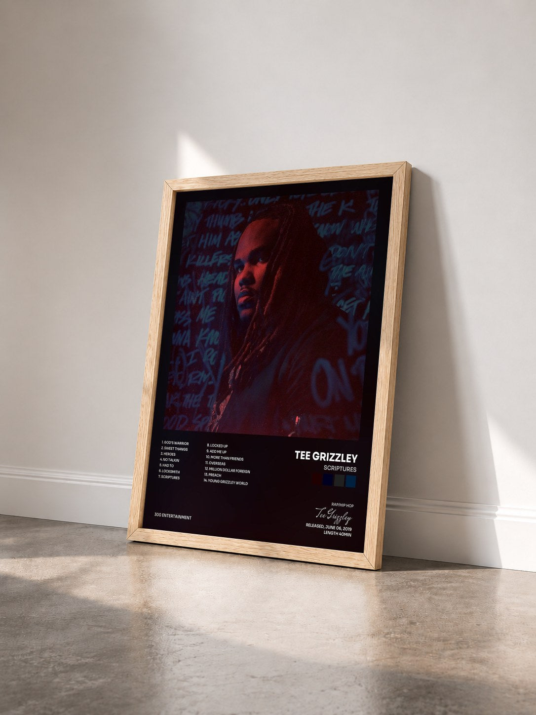 #bois Tableau de l'album Scriptures de Tee Grizzley vu de trois quarts, cadre en bois brut