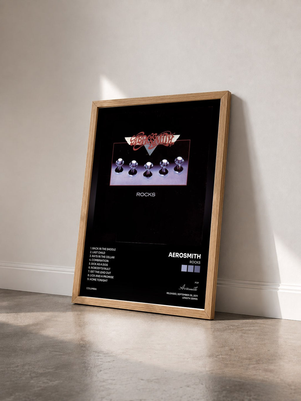 #bois Tableau de l'album Rocks de Aerosmith vu de trois quarts, cadre en bois brut