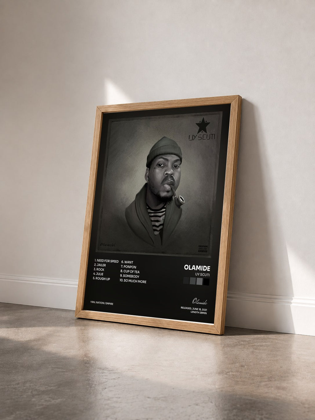 #bois Tableau de l'album UY Scuti de Olamide vu de trois quarts, cadre en bois brut