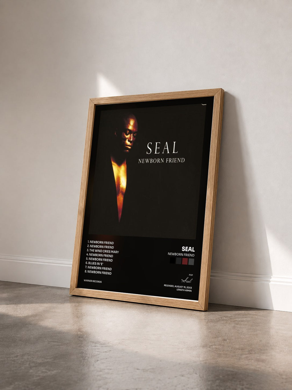 #bois Tableau de l'album Newborn Friend de Seal vu de trois quarts, cadre en bois brut