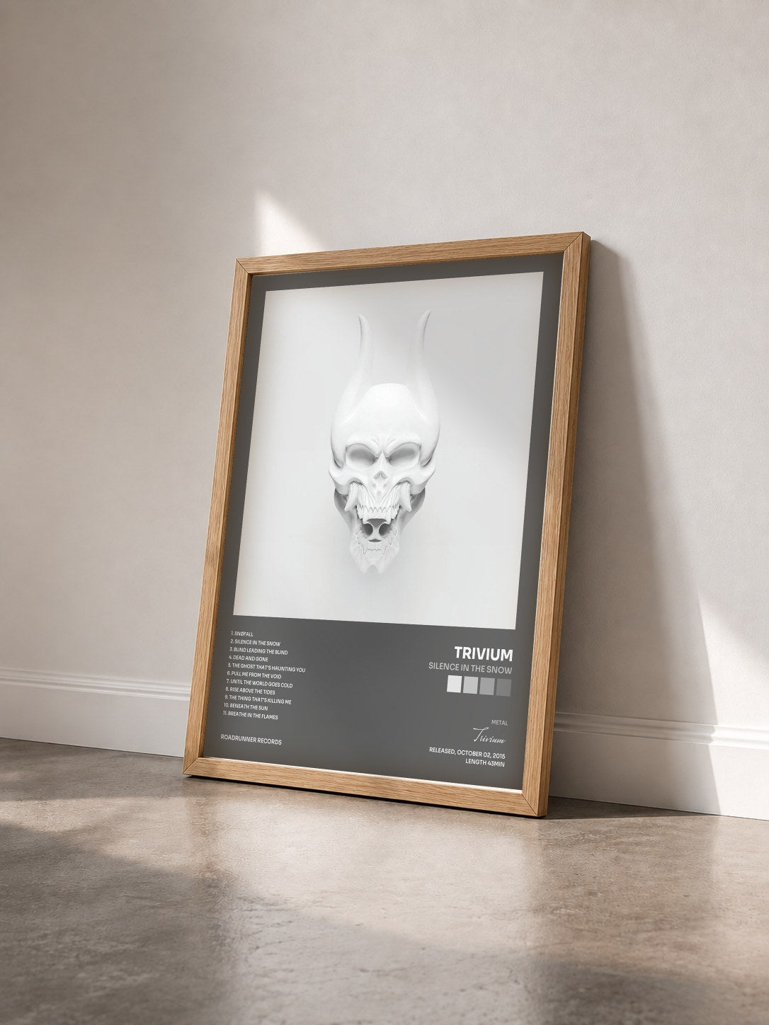 #bois Tableau de l'album Silence in the Snow de Trivium vu de trois quarts, cadre en bois brut