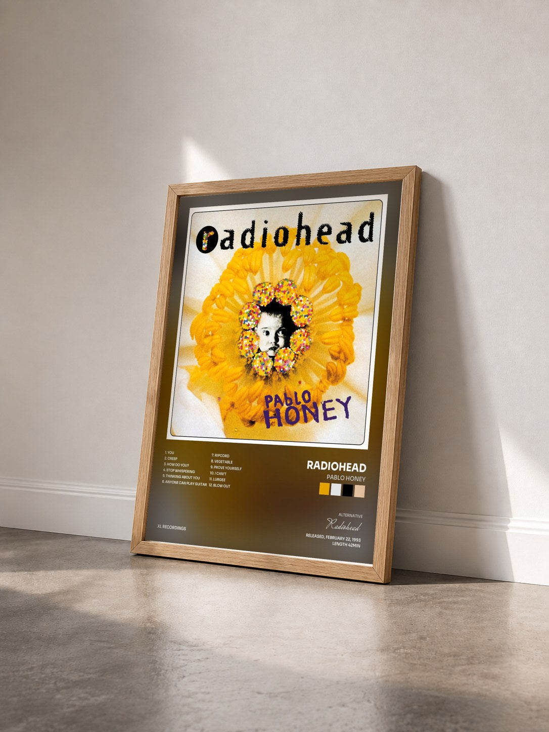 #bois Tableau de l'album Pablo Honey de Radiohead vu de trois quarts, cadre en bois brut