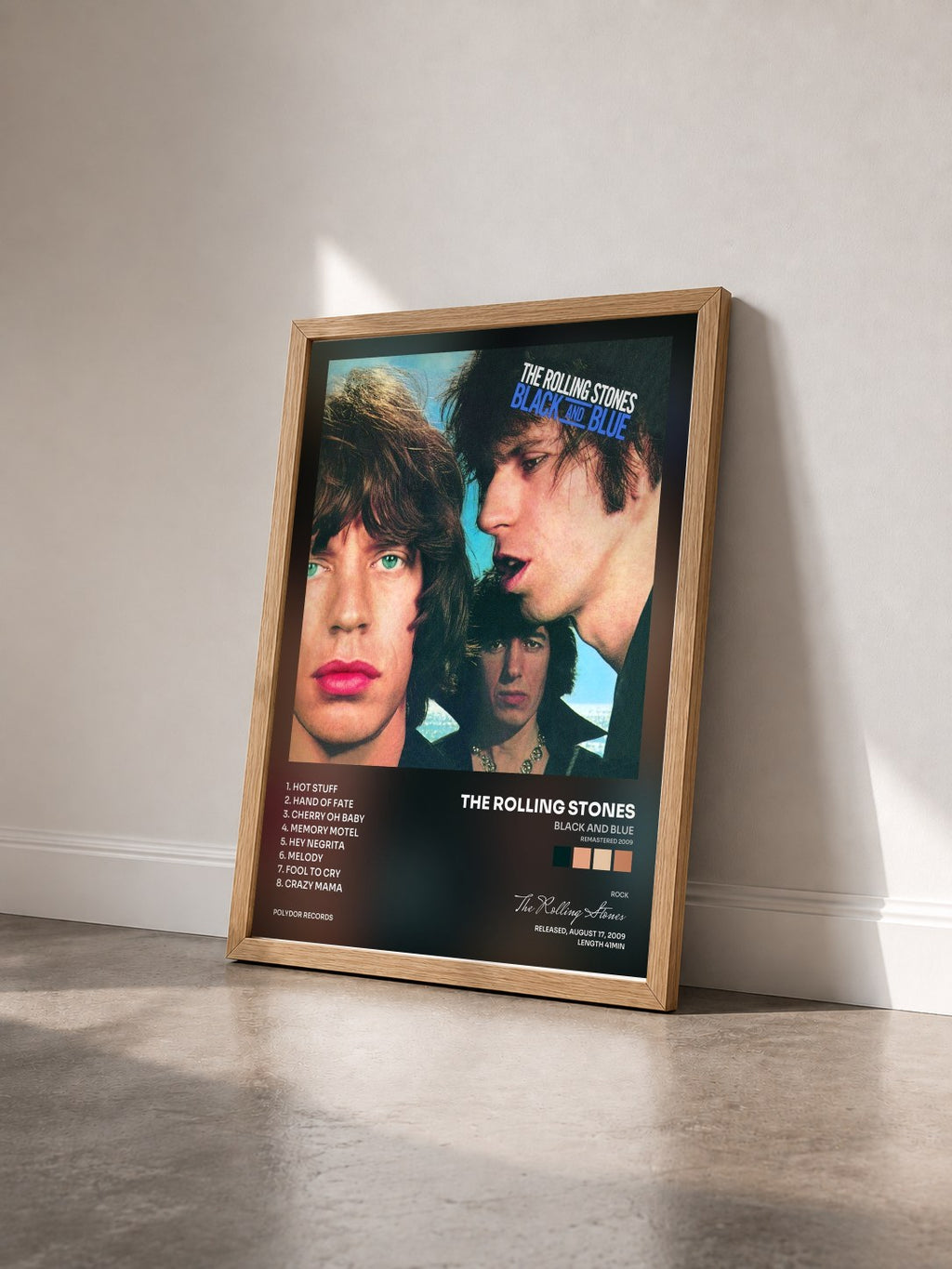 #bois Tableau de l'album Black And Blue (Remastered 2009) de The Rolling Stones vu de trois quarts, cadre en bois brut