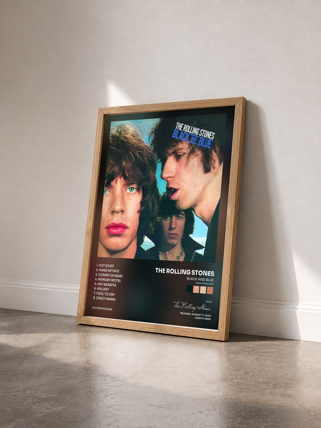 #bois Tableau de l'album Black And Blue (Remastered 2009) de The Rolling Stones vu de trois quarts, cadre en bois brut