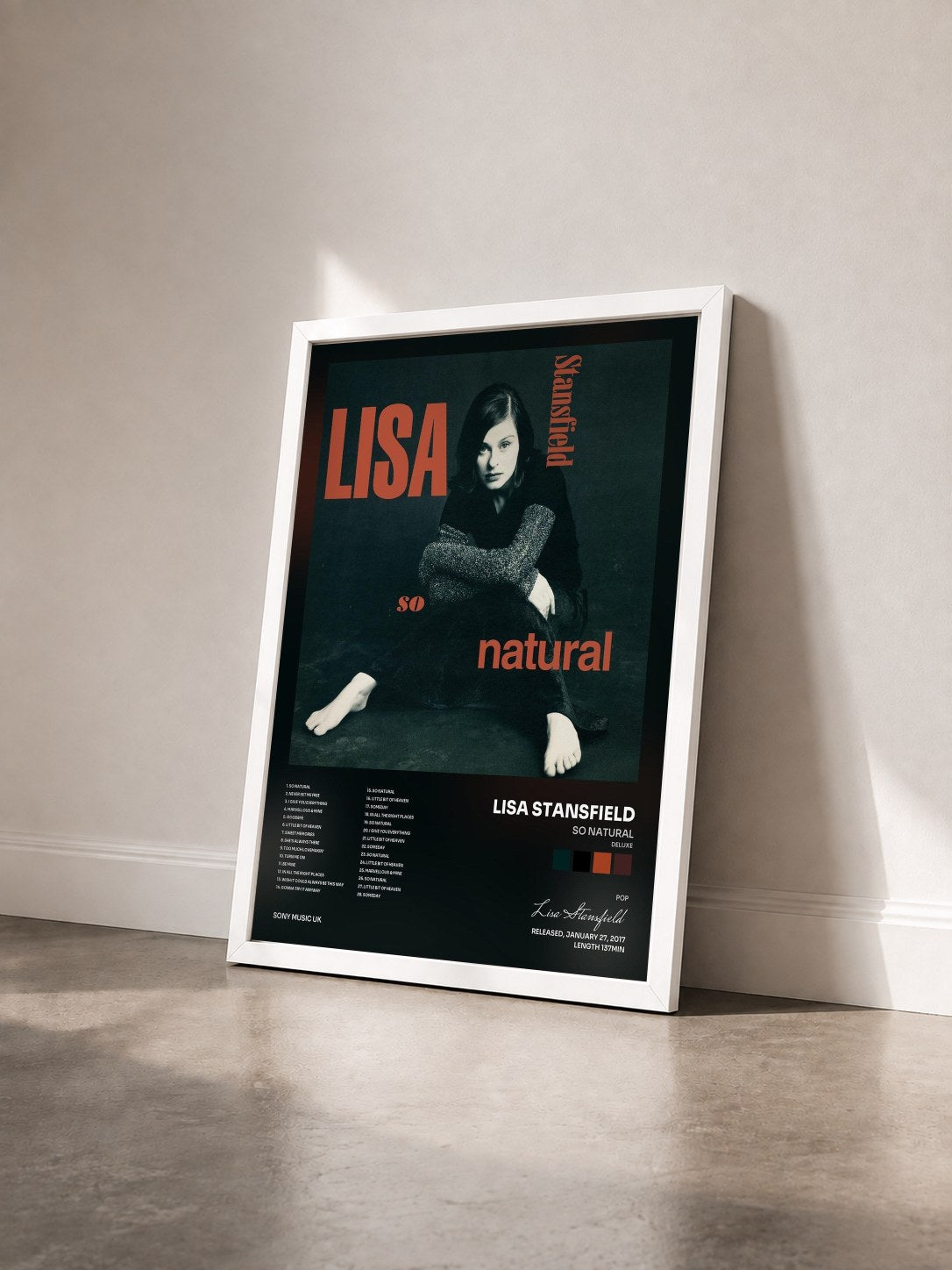 #blanc Tableau de l'album So Natural (Deluxe) de Lisa Stansfield vu de trois quarts, cadre blanc