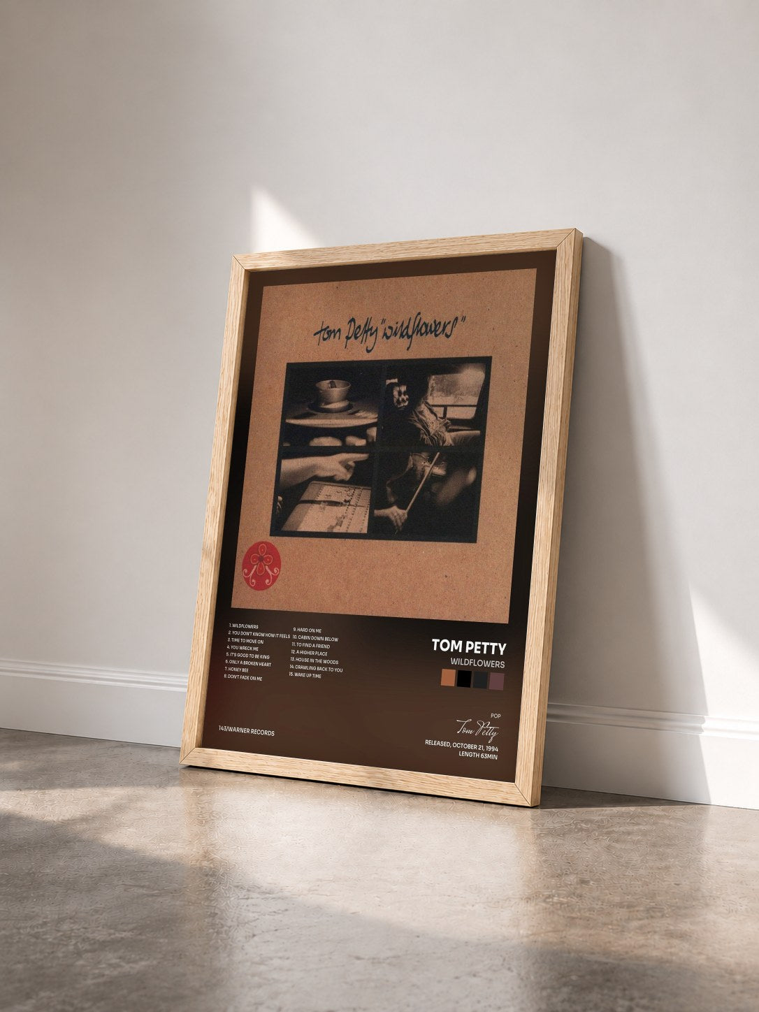 #bois Tableau de l'album Wildflowers de Tom Petty vu de trois quarts, cadre en bois brut