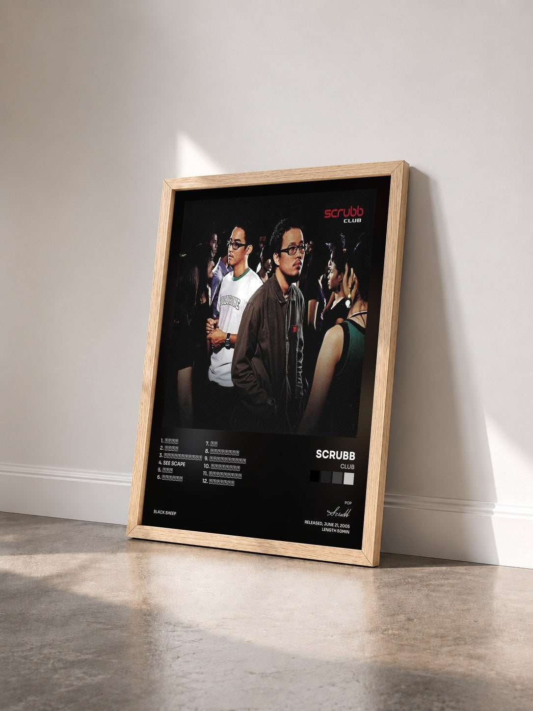 #bois Tableau de l'album Club de Scrubb vu de trois quarts, cadre en bois brut