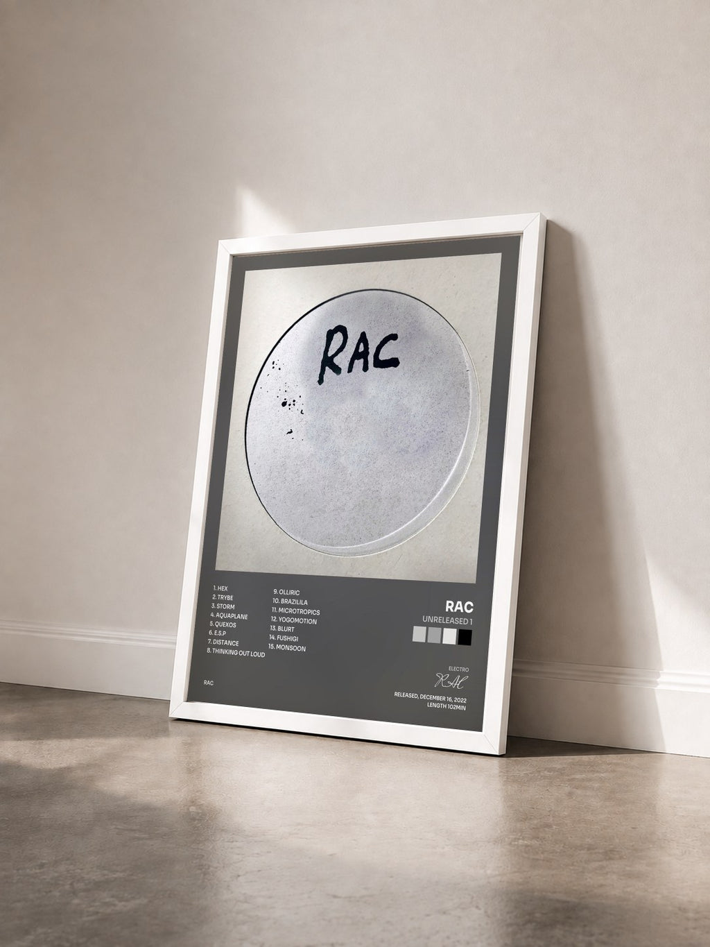 #blanc Tableau de l'album Unreleased 1 de RAC vu de trois quarts, cadre blanc