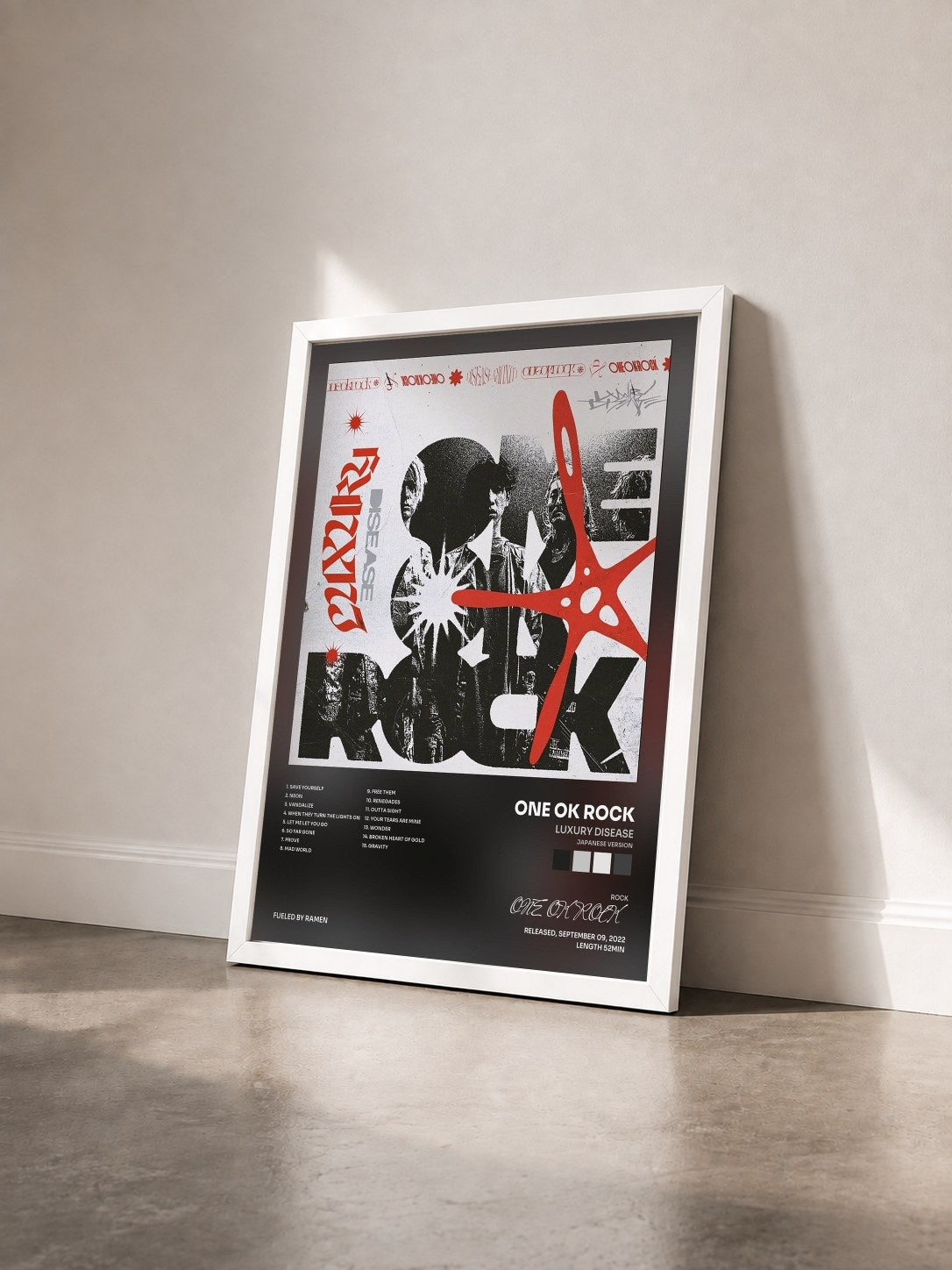 #blanc Tableau de l'album Luxury Disease (Japanese Version) de ONE OK ROCK vu de trois quarts, cadre blanc
