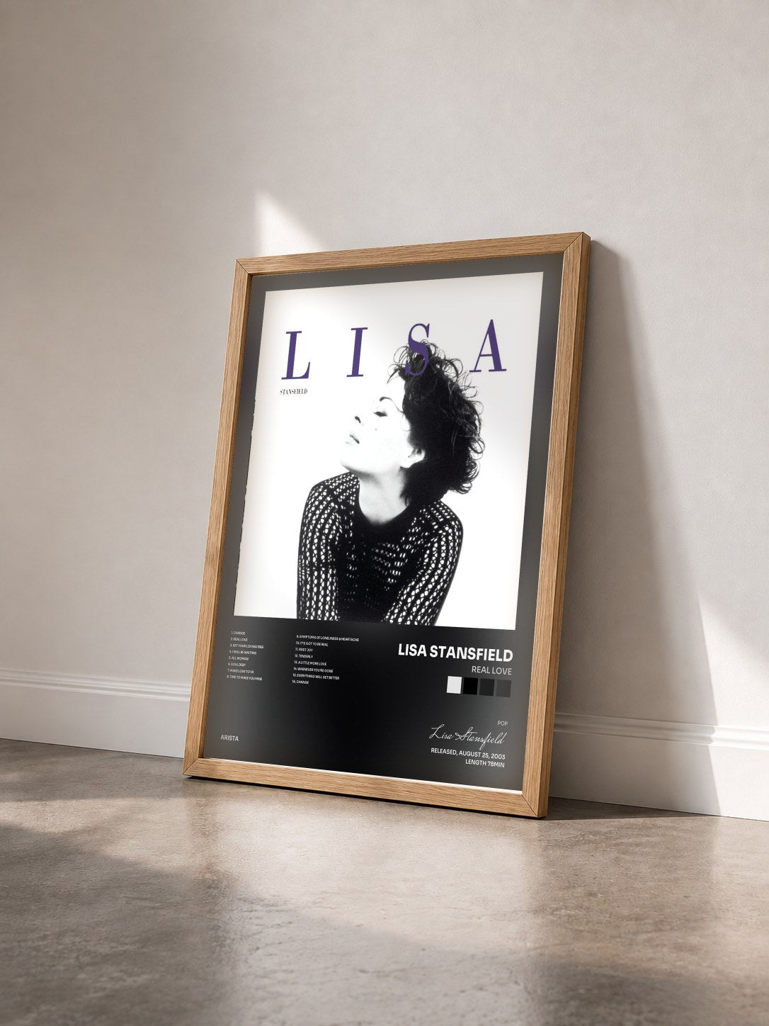 #bois Tableau de l'album Real Love de Lisa Stansfield vu de trois quarts, cadre en bois brut