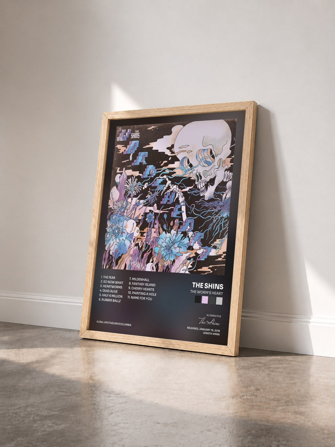 #bois Tableau de l'album The Worm's Heart de The Shins vu de trois quarts, cadre en bois brut