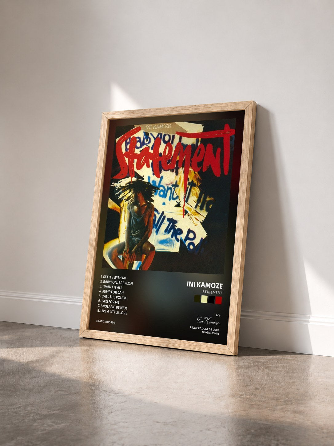 #bois Tableau de l'album Statement de Ini Kamoze vu de trois quarts, cadre en bois brut