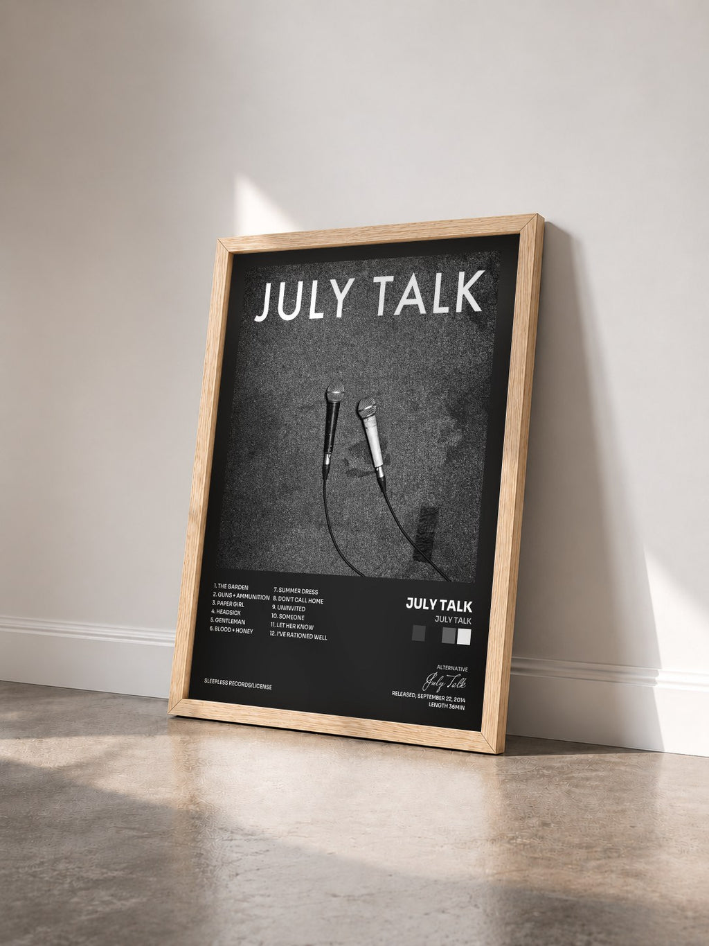 #bois Tableau de l'album July Talk de July Talk vu de trois quarts, cadre en bois brut