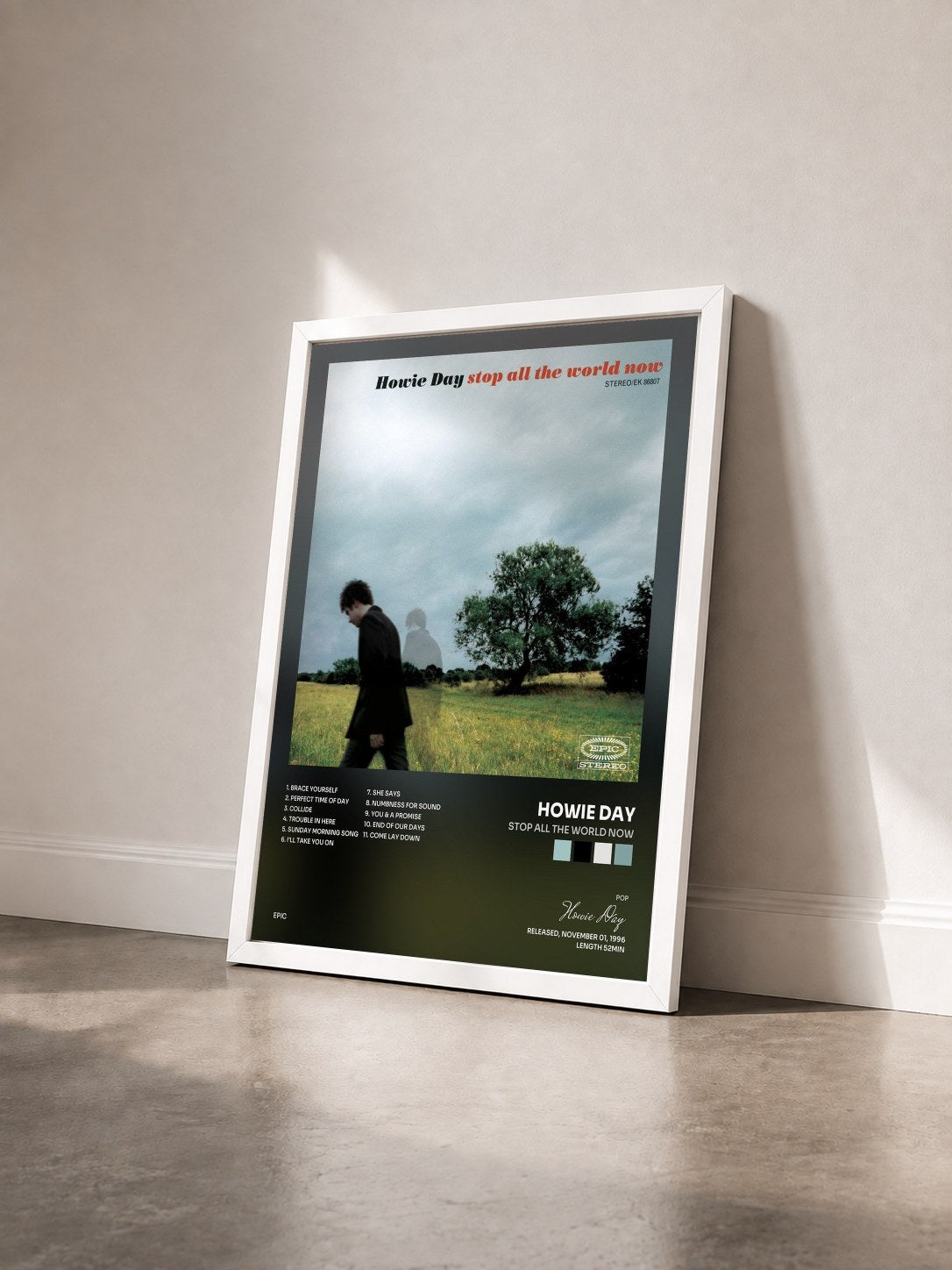 #blanc Tableau de l'album Stop All The World Now de Howie Day vu de trois quarts, cadre blanc