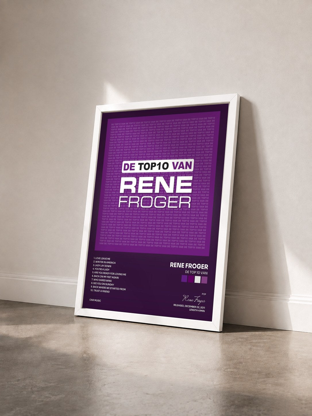 #blanc Tableau de l'album De Top 10 Van de Rene Froger vu de trois quarts, cadre blanc