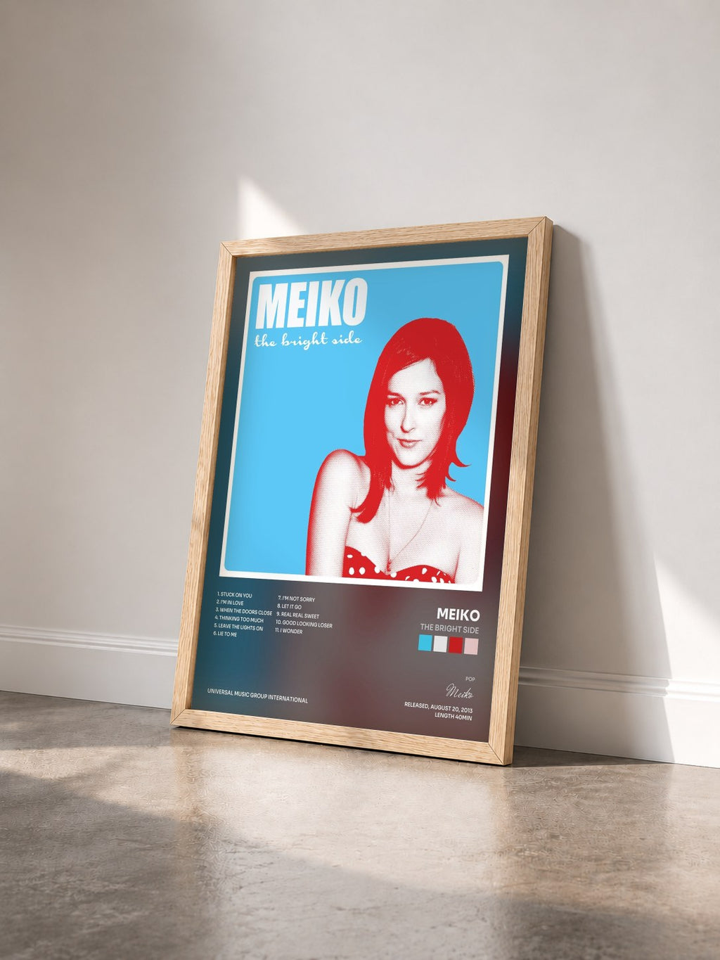 #bois Tableau de l'album The Bright Side de Meiko vu de trois quarts, cadre en bois brut