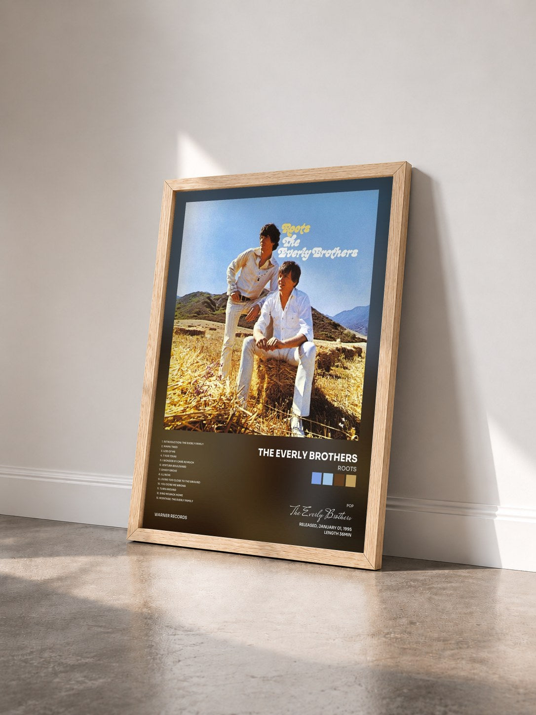 #bois Tableau de l'album Roots de The Everly Brothers vu de trois quarts, cadre en bois brut