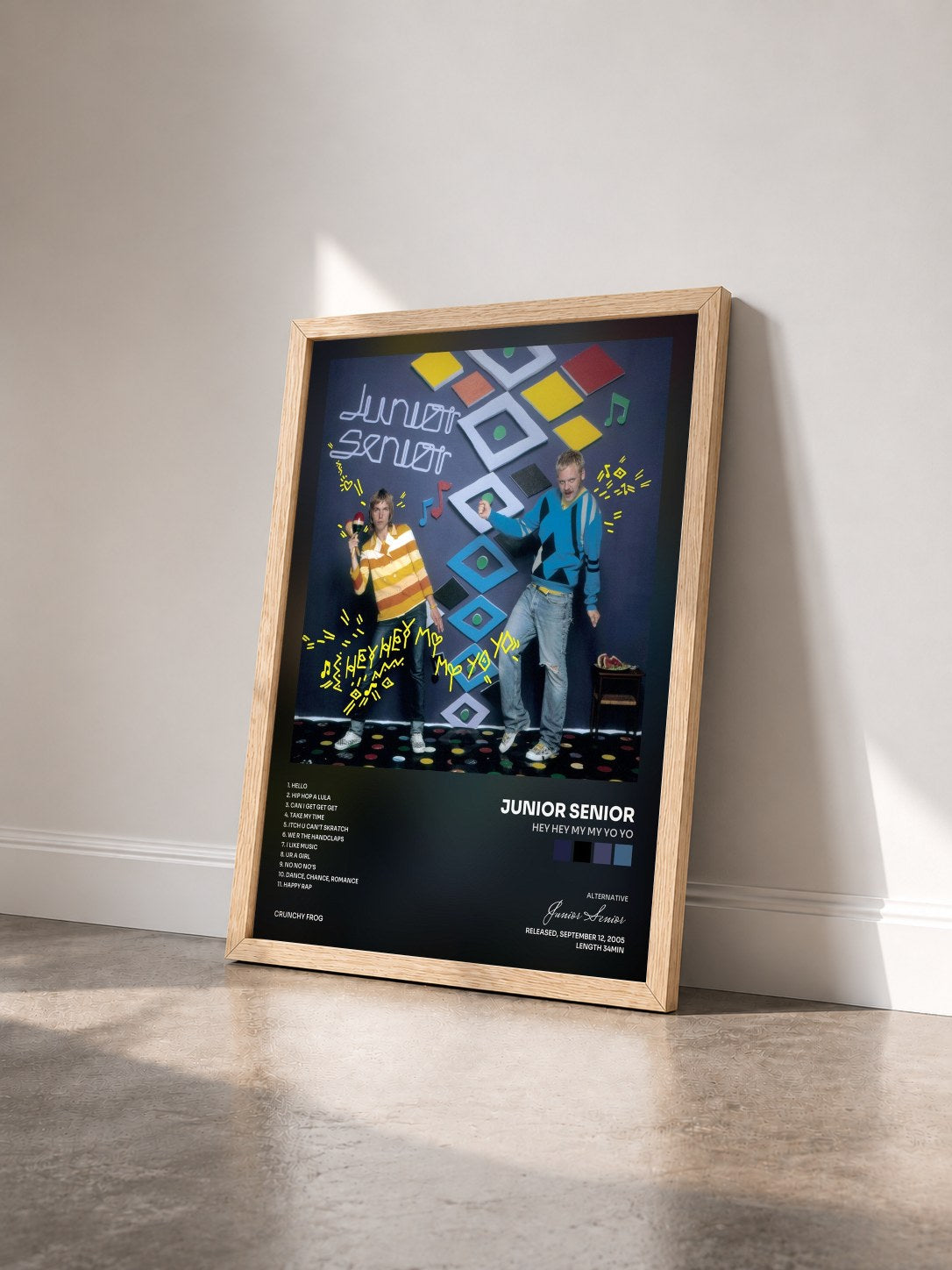 #bois Tableau de l'album Hey Hey My My Yo Yo de Junior Senior vu de trois quarts, cadre en bois brut