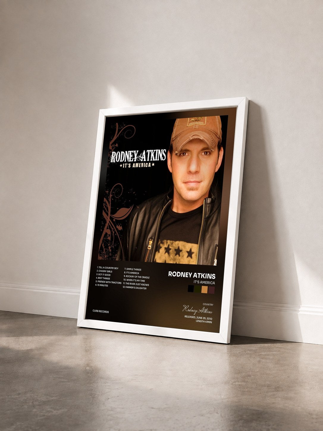 #blanc Tableau de l'album It's America de Rodney Atkins vu de trois quarts, cadre blanc