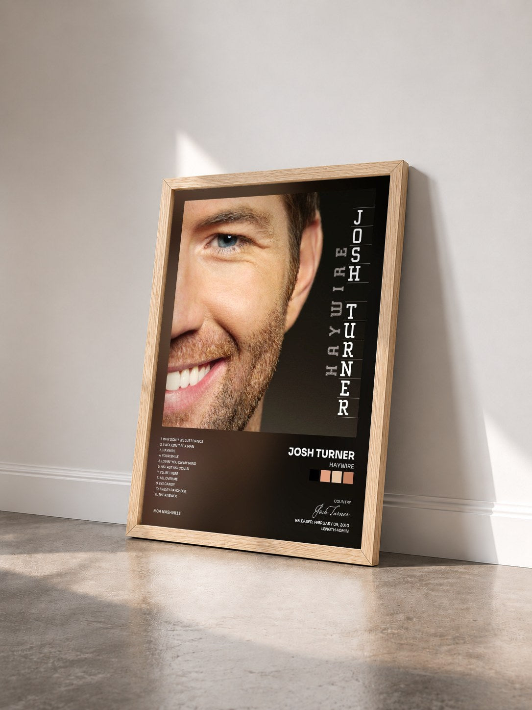 #bois Tableau de l'album Haywire de Josh Turner vu de trois quarts, cadre en bois brut