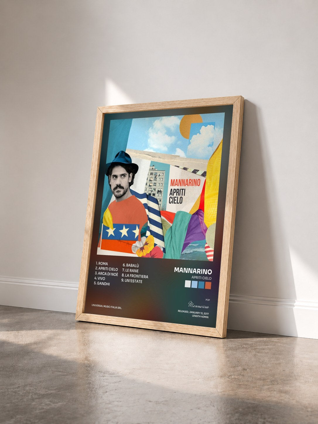 #bois Tableau de l'album Apriti Cielo de Mannarino vu de trois quarts, cadre en bois brut