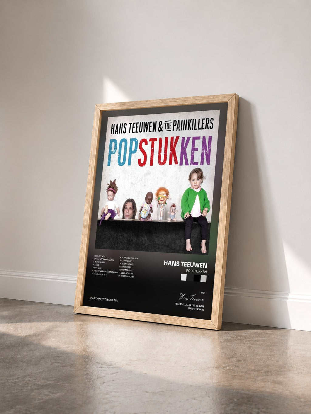 #bois Tableau de l'album Popstukken de Hans Teeuwen vu de trois quarts, cadre en bois brut